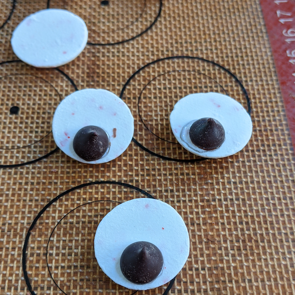 setting of chocolate chips on candy discs