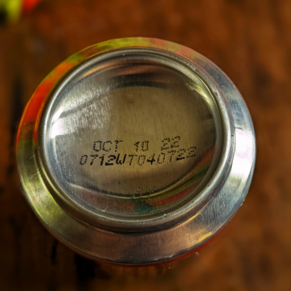 can of flamin hot mountain dew with date stamp