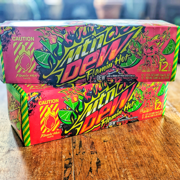 stacked cases of flamin hot mountain dew