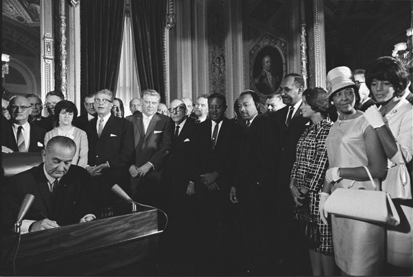 president johnson signs voting rights act into law